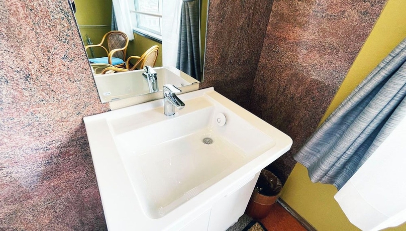 Imagen de la habitación del Hotel ATAMI SPRING TERRACE HOTEL. Foto 12