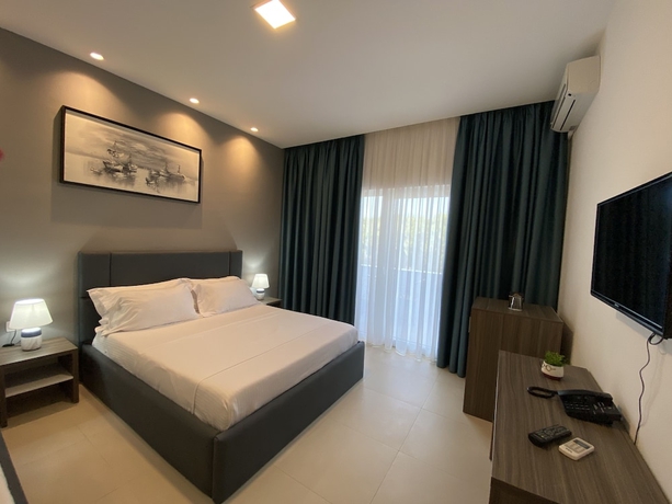 Imagen de la habitación del Hotel ATRIUM DELUXE RESORT. Foto 14