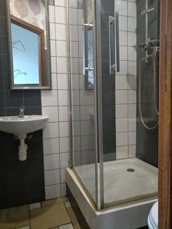 Imagen de la habitación del Hotel ATRIUM Guesthouse. Foto 6