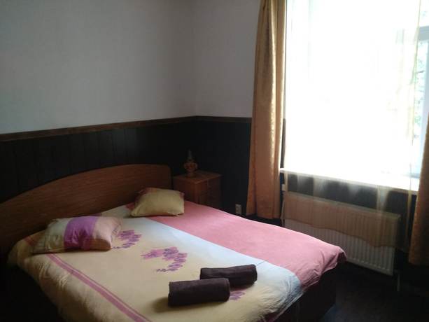 Imagen de la habitación del Hotel ATRIUM Guesthouse. Foto 16
