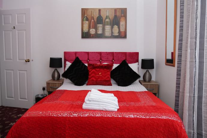 Imagen de la habitación del Hotel ATZ&H Inn. Foto 11