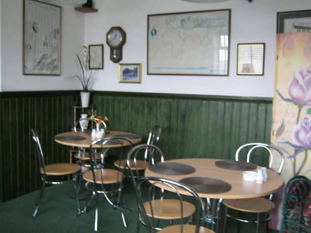 Imagen de los interiores del Hotel ATZ&H Inn. Foto 15