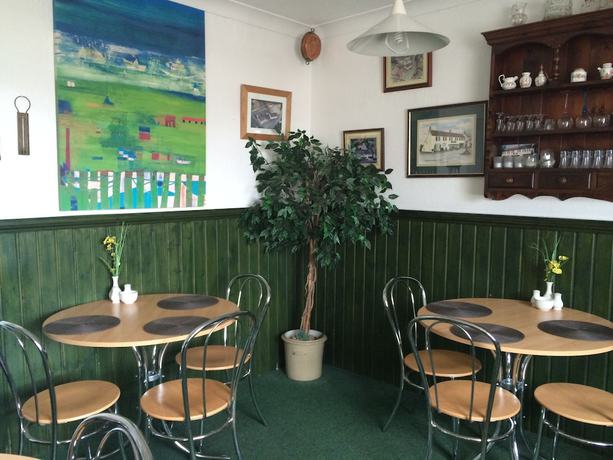 Imagen del bar/restaurante del Hotel ATZ&H Inn. Foto 8