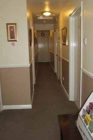 Imagen de los interiores del Hotel ATZ&H Inn. Foto 16