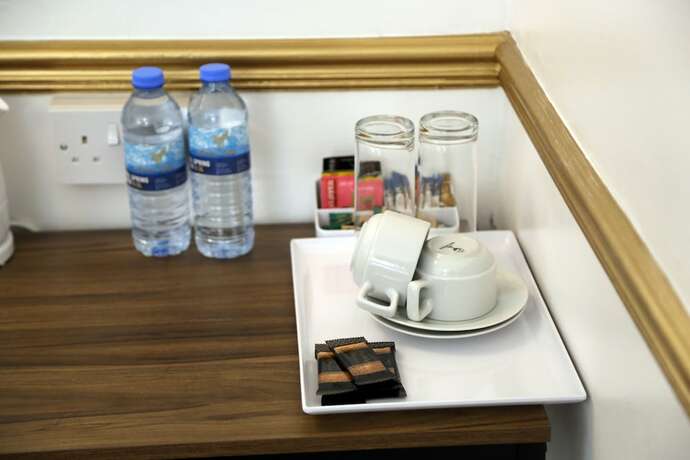 Imagen de la habitación del Hotel ATZandH Inn. Foto 11