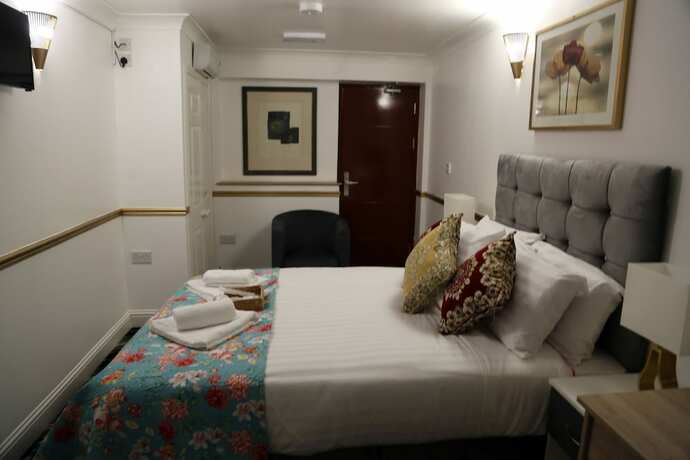 Imagen de la habitación del Hotel ATZandH Inn. Foto 15