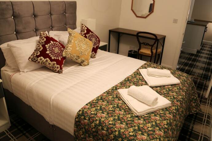 Imagen de la habitación del Hotel ATZandH Inn. Foto 20