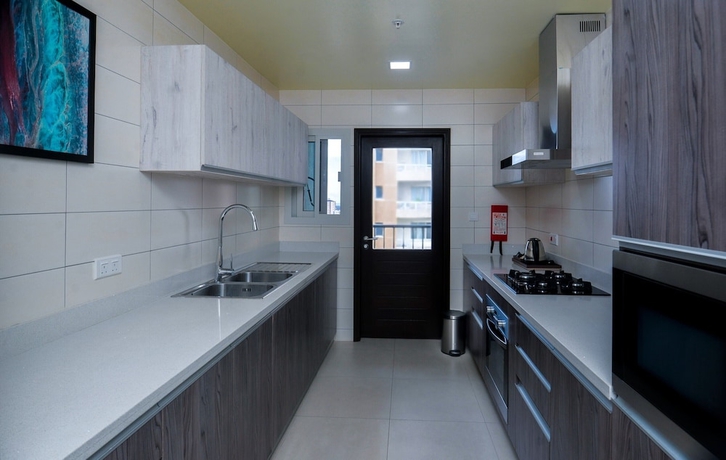 Imagen de la habitación del Hotel AURA SUITES, DAR ES SALAAM. Foto 9