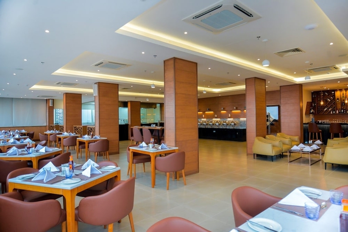 Imagen del bar/restaurante del Hotel AURA SUITES, DAR ES SALAAM. Foto 2