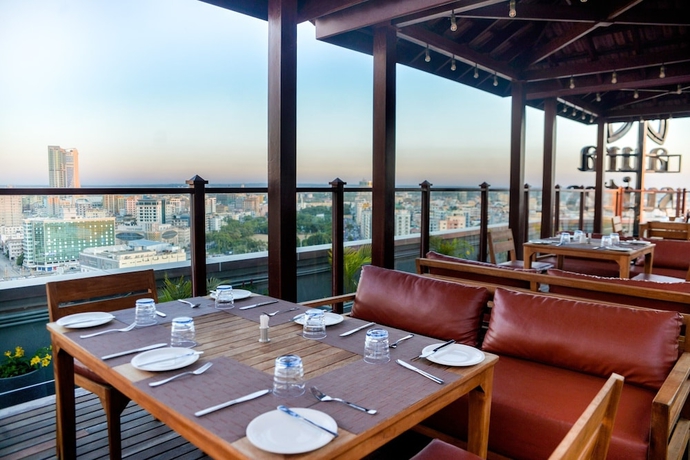 Imagen del bar/restaurante del Hotel AURA SUITES, DAR ES SALAAM. Foto 3