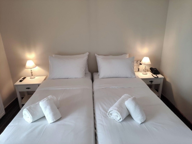Imagen de la habitación del Hotel AURORA-INN. Foto 11