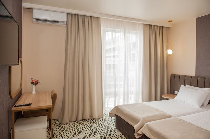 Imagen de la habitación del Hotel AURUM Family Resort and Spa. Foto 4