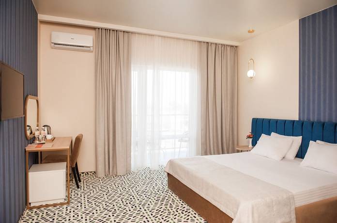 Imagen de la habitación del Hotel AURUM Family Resort and Spa. Foto 6