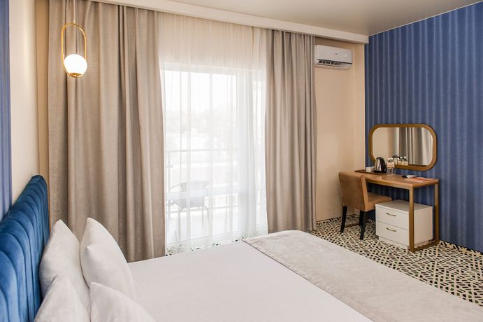 Imagen de la habitación del Hotel AURUM Family Resort and Spa. Foto 16