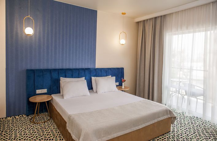 Imagen de la habitación del Hotel AURUM Family Resort and Spa. Foto 17