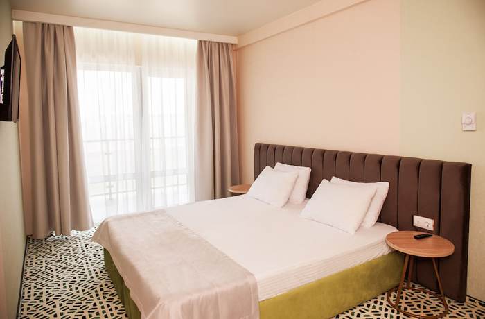Imagen de la habitación del Hotel AURUM Family Resort and Spa. Foto 18