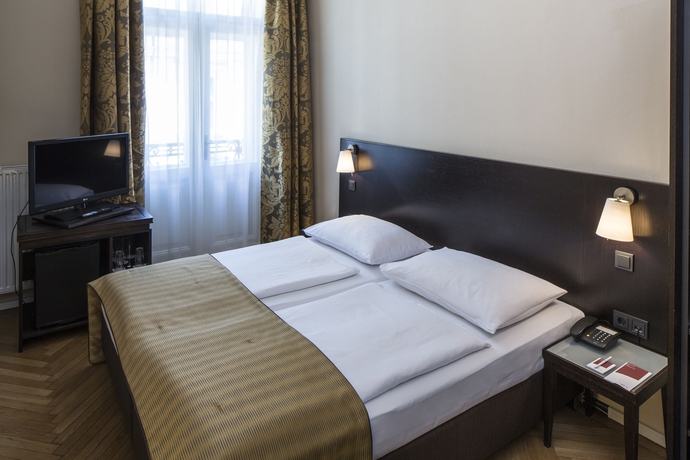 Imagen de la habitación del Hotel AUSTRIA TREND ASTORIA. Foto 6