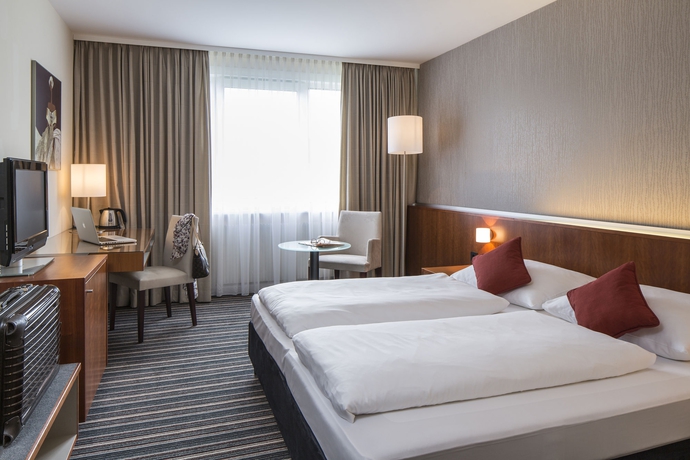 Imagen de la habitación del Hotel AUSTRIA TREND BOSEI. Foto 5