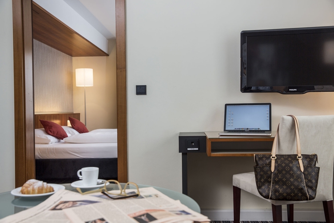 Imagen de la habitación del Hotel AUSTRIA TREND BOSEI. Foto 8