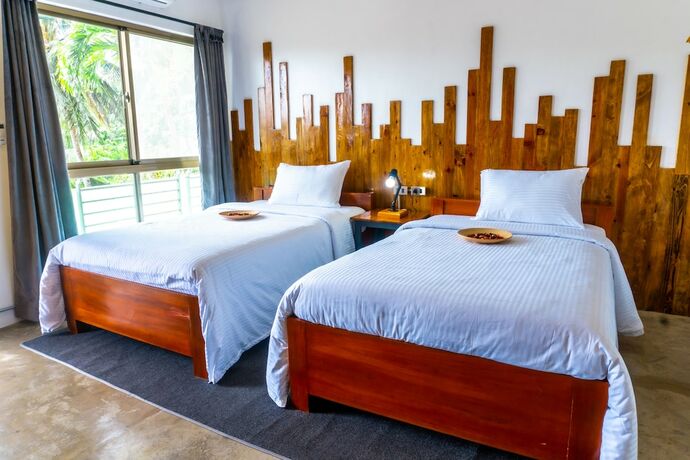 Imagen de la habitación del Hotel AV Suites. Foto 13