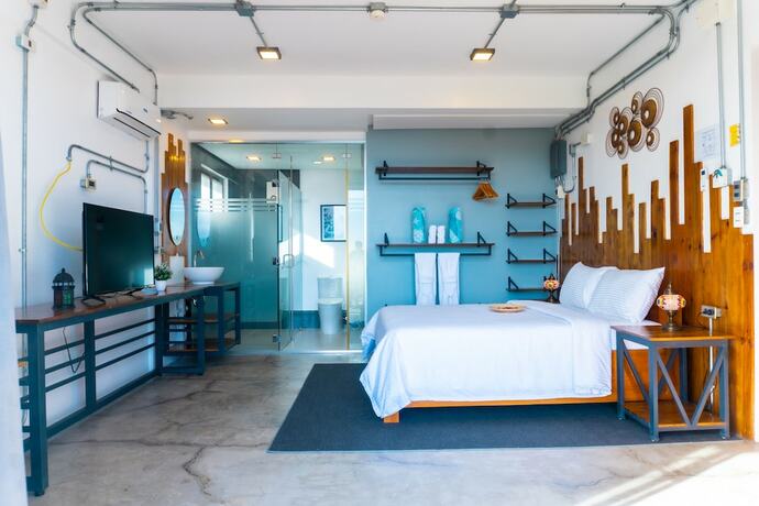 Imagen de la habitación del Hotel AV Suites. Foto 15