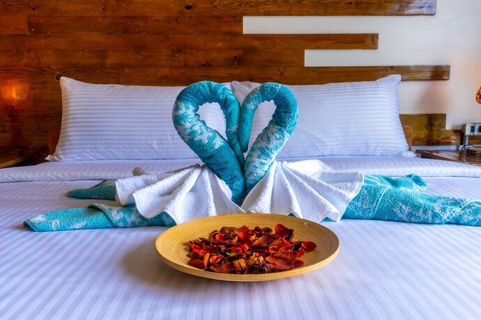 Imagen de la habitación del Hotel AV Suites. Foto 16