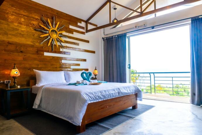 Imagen de la habitación del Hotel AV Suites. Foto 17