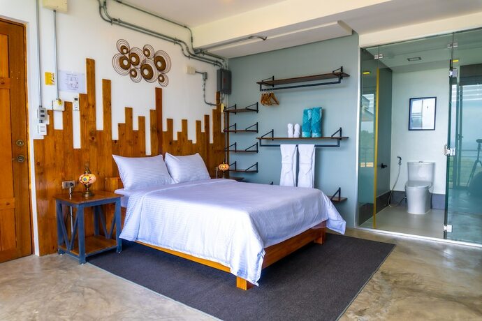 Imagen de la habitación del Hotel AV Suites. Foto 19