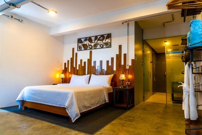 Imagen de la habitación del Hotel AV Suites. Foto 20