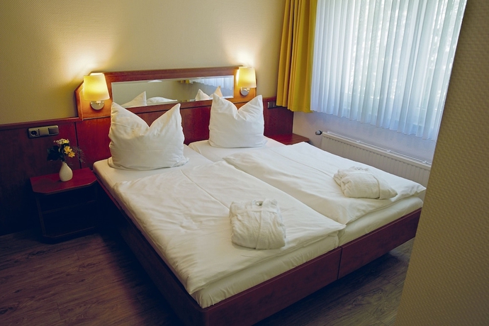 Imagen de la habitación del Hotel AVALONpark K&ouml;nigshof, K&ouml;nigslutter am Elm. Foto 4