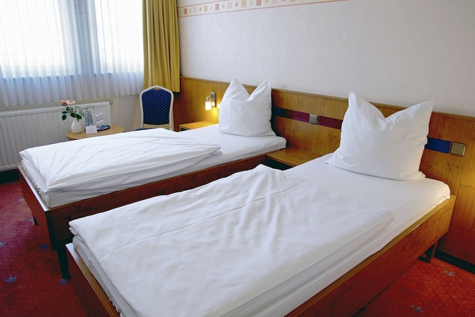 Imagen de la habitación del Hotel AVALONpark K&ouml;nigshof, K&ouml;nigslutter am Elm. Foto 12
