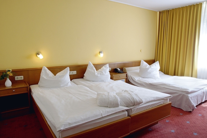 Imagen de la habitación del Hotel AVALONpark K&ouml;nigshof, K&ouml;nigslutter am Elm. Foto 13