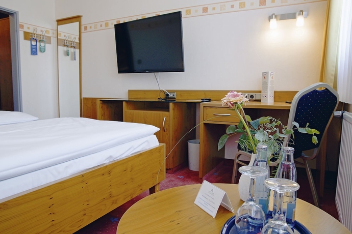 Imagen de la habitación del Hotel AVALONpark K&ouml;nigshof, K&ouml;nigslutter am Elm. Foto 14