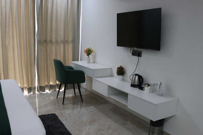 Imagen de la habitación del Hotel AVAs and Corporates Millennium City. Foto 8