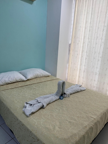 Imagen de la habitación del Hotel AW Rodadero Suites. Foto 3
