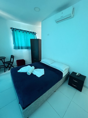 Imagen de la habitación del Hotel AW Rodadero Suites. Foto 8