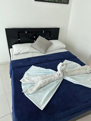 Imagen de la habitación del Hotel AW Rodadero Suites. Foto 10