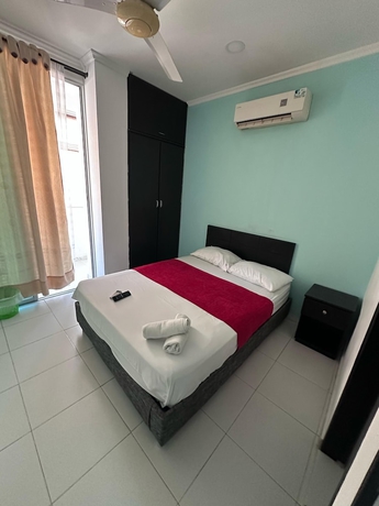 Imagen de la habitación del Hotel AW Rodadero Suites. Foto 11