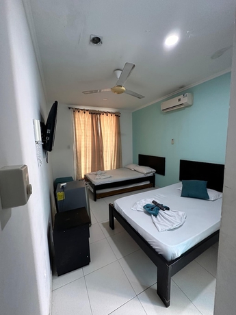Imagen de la habitación del Hotel AW Rodadero Suites. Foto 14
