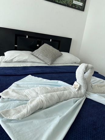 Imagen de la habitación del Hotel AW Rodadero Suites. Foto 15