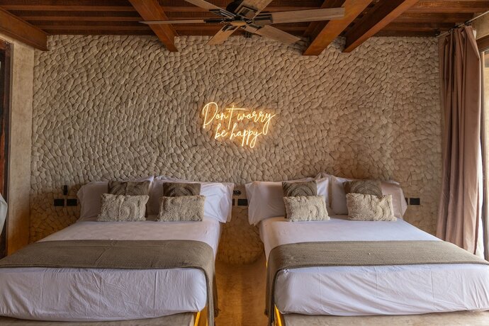 Imagen de la habitación del Hotel AWA Holbox, Boutique. Foto 17