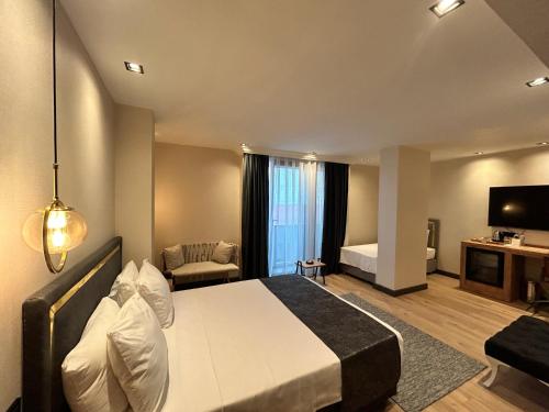 Imagen de la habitación del Hotel AYATOURE HOTEL. Foto 16