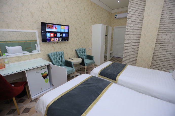 Imagen de la habitación del Hotel AYNIY HOTEL. Foto 6