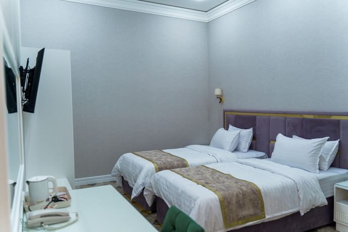 Imagen de la habitación del Hotel AYNIY HOTEL. Foto 7