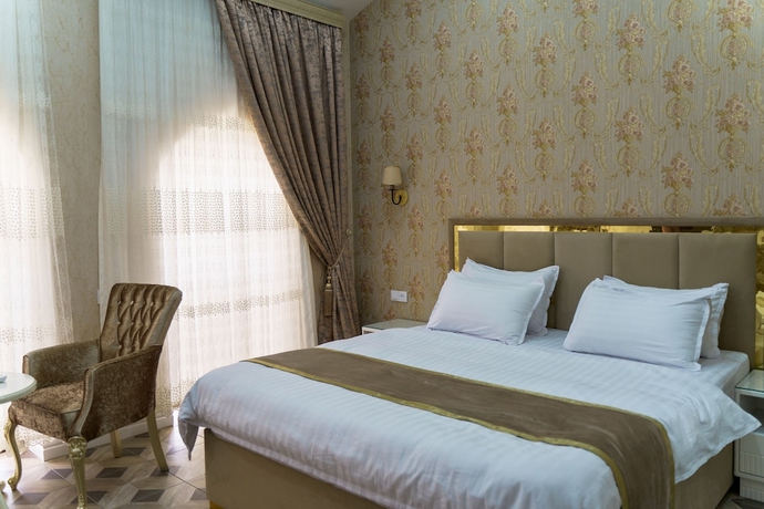 Imagen de la habitación del Hotel AYNIY HOTEL. Foto 8