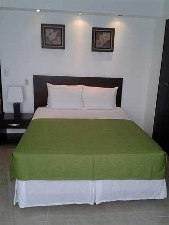 Imagen de la habitación del Hotel AZ Suites. Foto 5