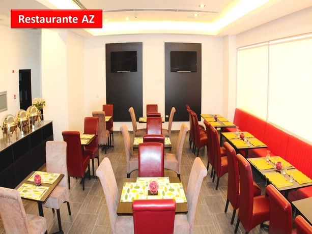 Imagen del bar/restaurante del Hotel AZ Suites. Foto 2