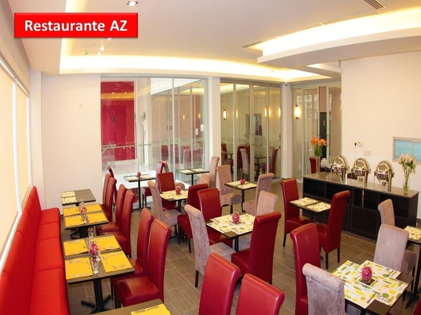 Imagen del bar/restaurante del Hotel AZ Suites. Foto 3