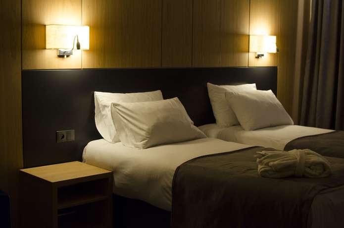 Imagen de la habitación del Hotel AZZA and Restaurant. Foto 17