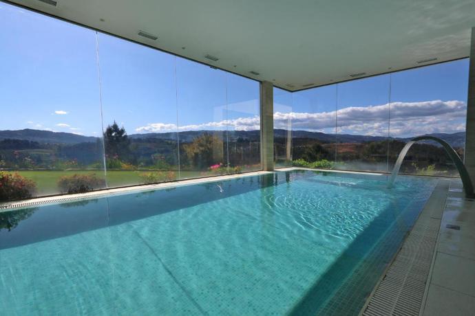 Imagen de la piscina del Hotel &Aacute;gua Hotels Mondim De Basto. Foto 15
